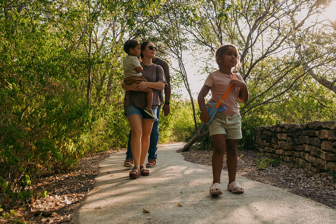 family on walking trail at SABG